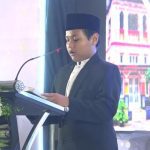 Haidar tampil membacakan Al-Quran dengan tenang di acara Mugeb Impressive Achievement. Siswa penghafal 3 Juz Al-Quran itu cermin kolaborasi yang apik antara sekolah dengan orang tua.